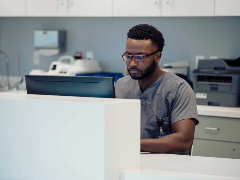 Clinician uses computer